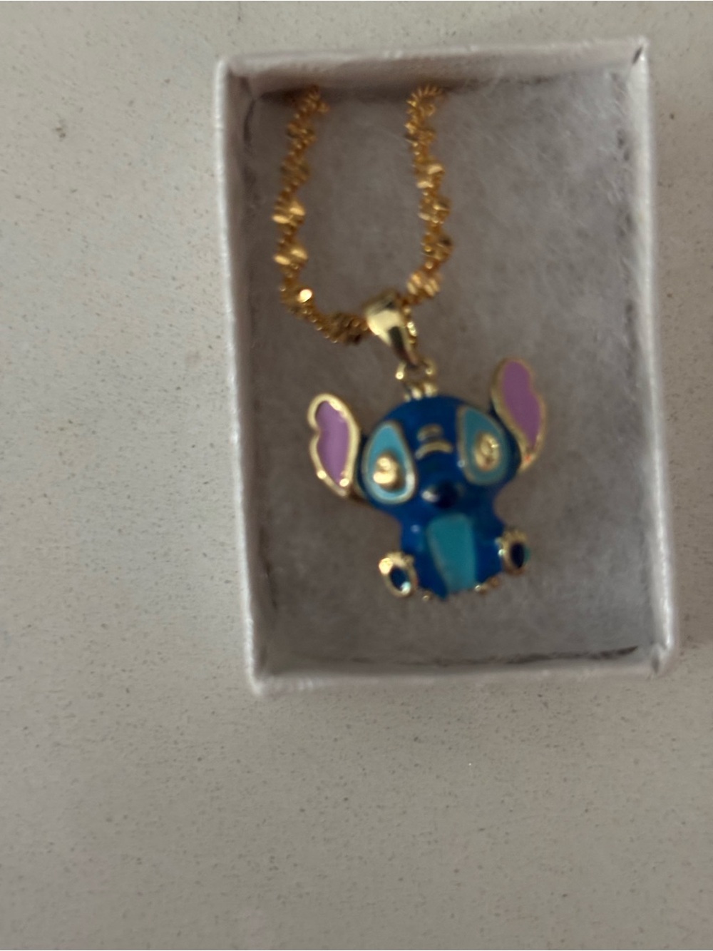 Gold-Tone Stitch Character Pendant Necklace